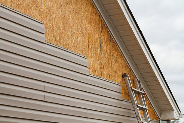 Professional Siding Installation technician working in Allentown, NJ